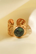 18k gold plated malachite leaf ring with detailed leaf design, showcasing vibrant green malachite stone and elegant gold plating.