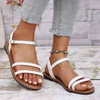 Open toe flats sandals by Shopimist featuring a sleek design, neutral color, and comfortable slip-on style.