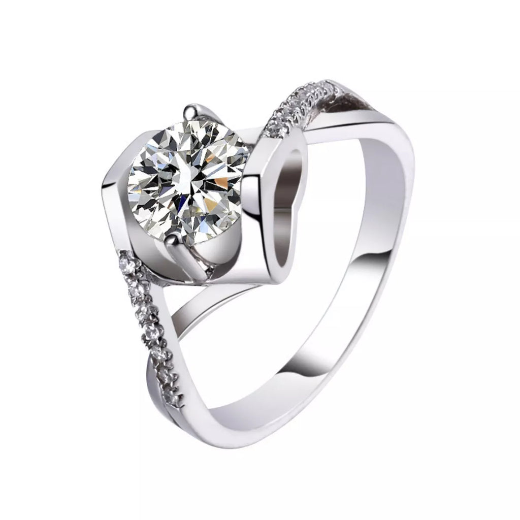 Sterling silver moissanite ring with 1 carat gemstone, featuring a sleek design and polished finish.