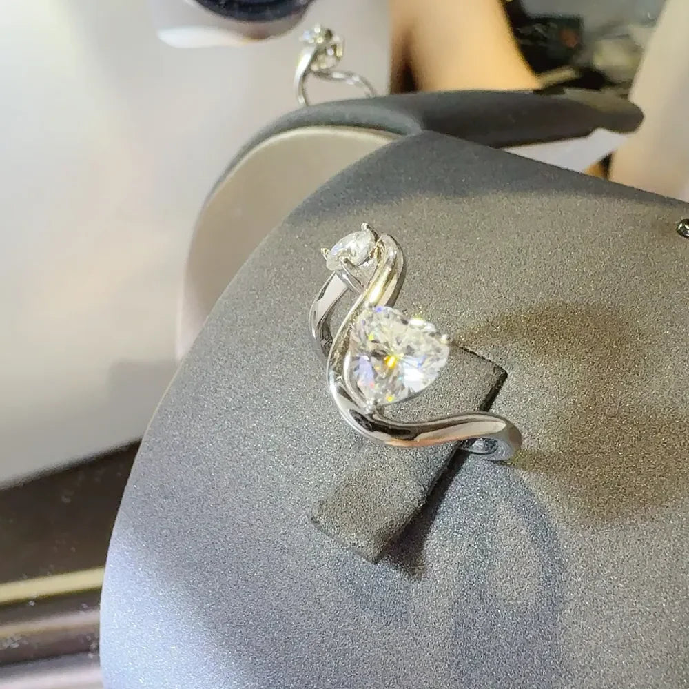 Sterling silver irregular shape ring with 1.3 carat moissanite gemstone, featuring a unique, modern design by Shopimist.