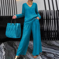 FitiqueFit solid color long sleeve top and pants two-piece travel set, casual and comfortable clothing for travel or lounging.