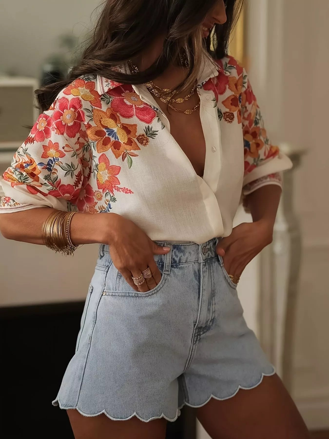 Floral print button-up shirt from Plush Fashion Hub, featuring a vibrant design and classic collar, perfect for casual wear.