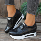 Women's crocodile pattern faux leather platform slip-on sneakers with casual style and textured crocodile design.