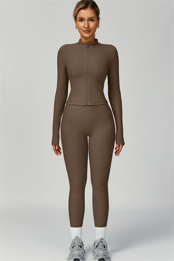 Fitglutes activewear 3-piece set featuring a sports bra, jacket, and leggings designed for workout and gym activities.