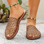 Women's woven net low heel sandals by Trendsi featuring comfortable PU leather design and stylish dress shoe appearance.