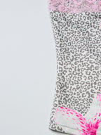 Women's leopard print cami top by Trendsi featuring delicate lace trim and stylish animal print design.