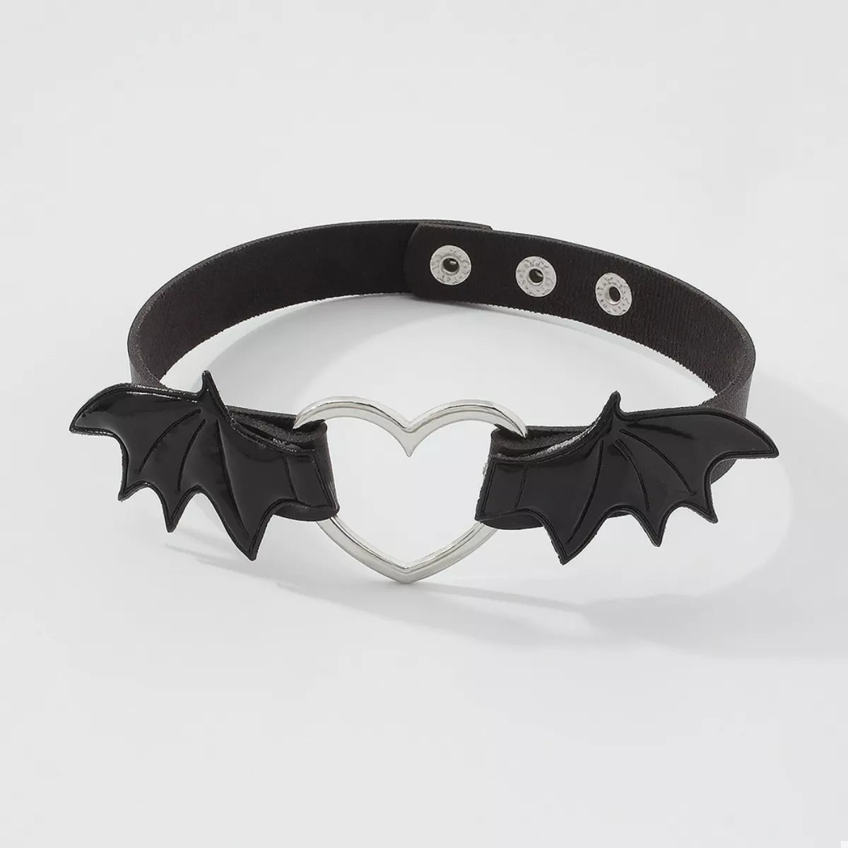 Gothic black choker necklace with bat wing and heart design, Shopimist style, featuring dark, intricate jewelry details.