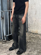 Men's vintage washed frayed hem denim jeans by Plush Fashion Hub, showing distressed details and classic denim texture.