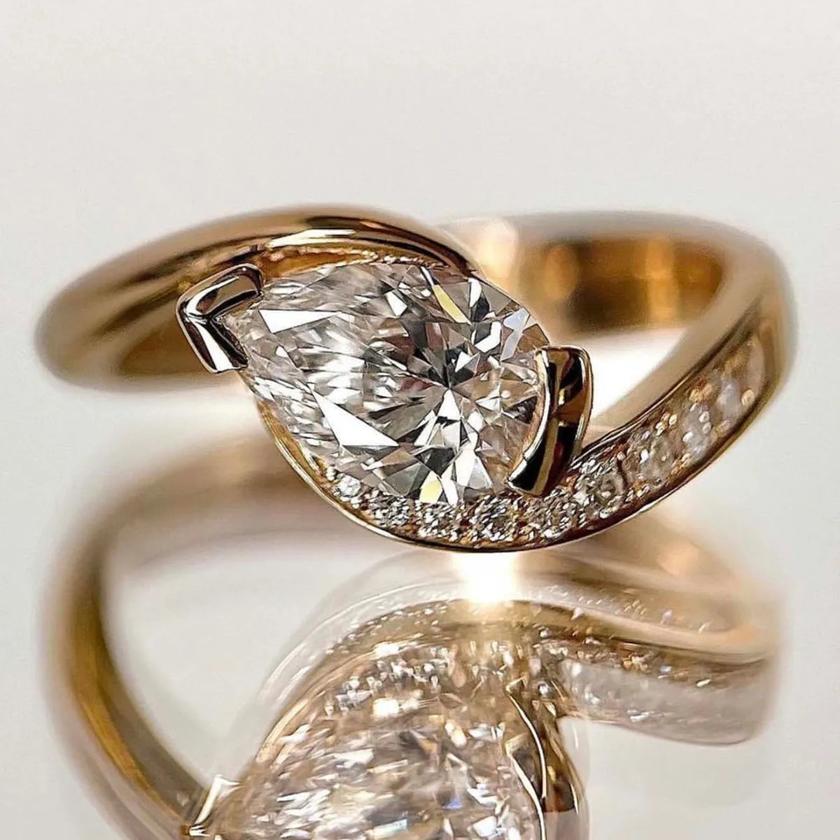 Sterling silver moissanite ring with 1.5 carats, featuring a sparkling central stone and elegant band design.
