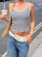 Striped scoop neck tank top from Trendsi, featuring a casual fit with horizontal stripe pattern and sleeveless design.
