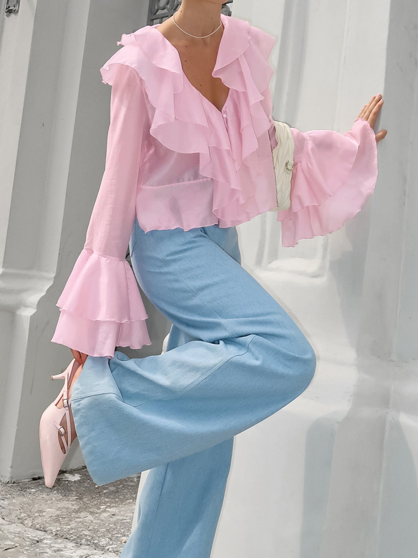 Women's elegant long sleeve blouse with ruffle trim, soft Tencel blend fabric, stylish and comfortable top from Trendsi.