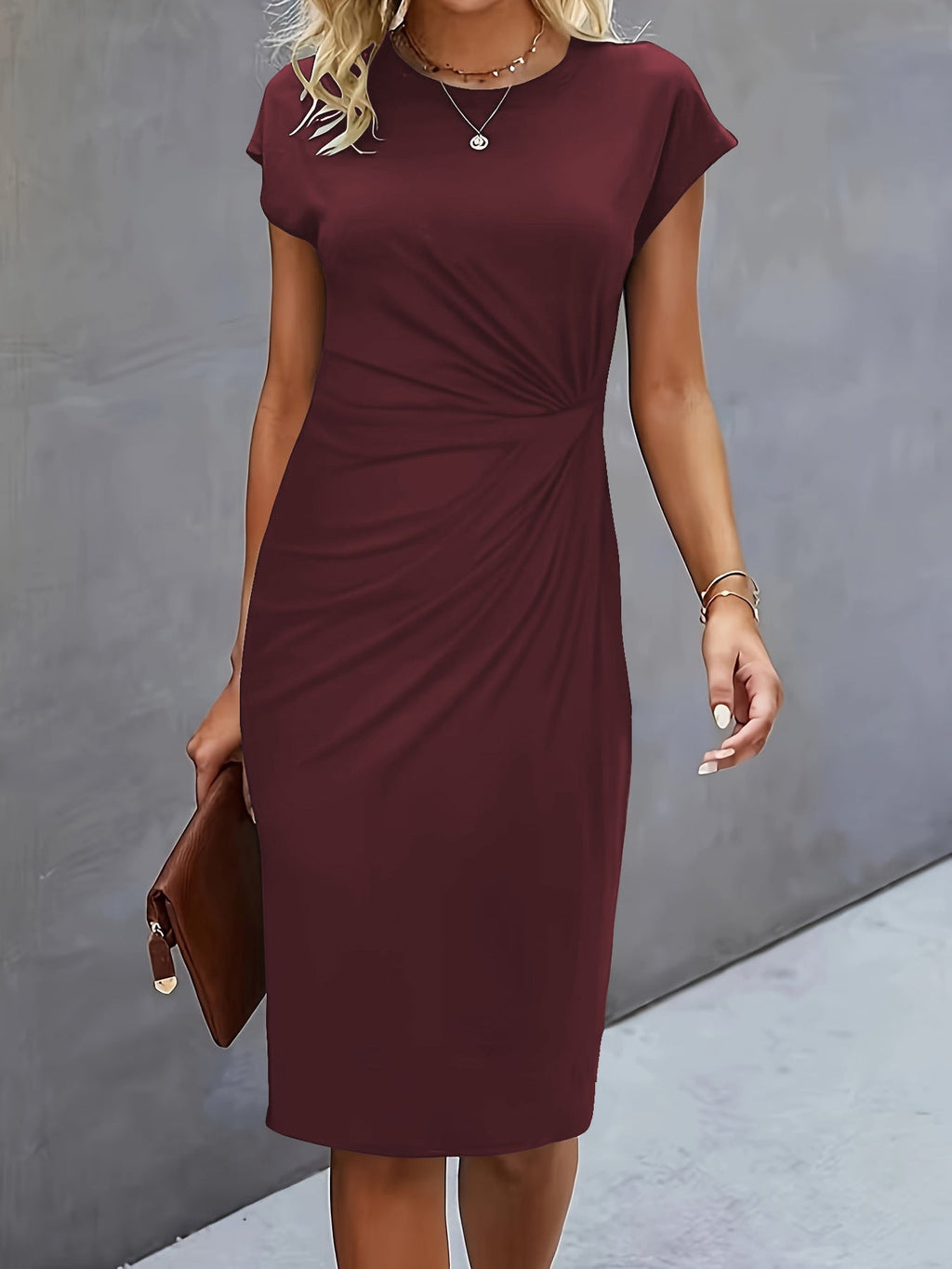 FitiqueFit front knot bodycon midi dress with round neck and sleeveless tie design, showcasing a sleek, fitted silhouette.