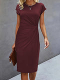 FitiqueFit front knot bodycon midi dress with round neck and sleeveless tie design, showcasing a sleek, fitted silhouette.