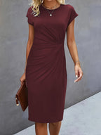 FitiqueFit front knot bodycon midi dress with round neck and sleeveless tie design, showcasing a sleek, fitted silhouette.