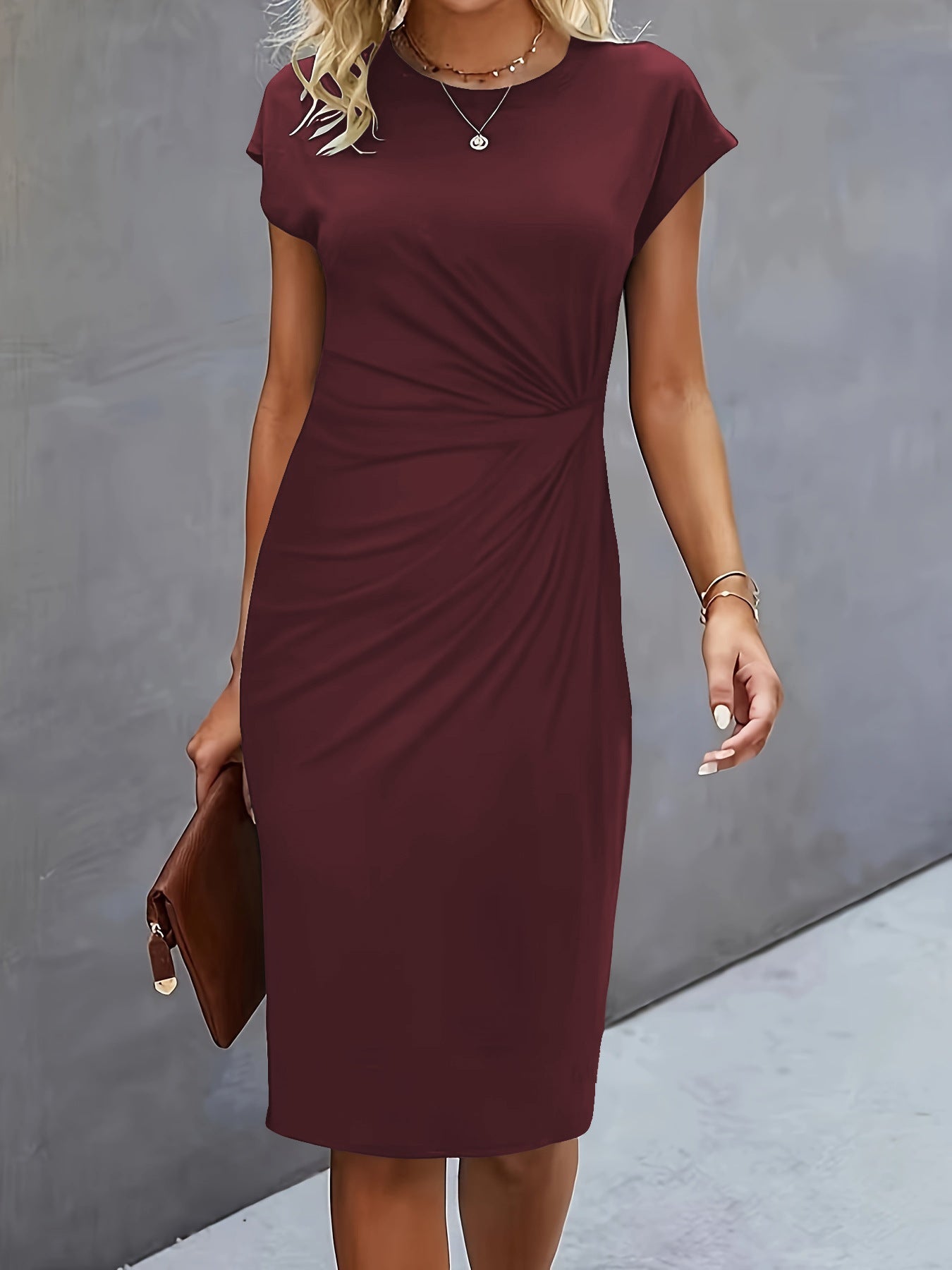 FitiqueFit front knot bodycon midi dress with round neck and sleeveless tie design, showcasing a sleek, fitted silhouette.