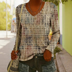 Women's ethnic print V-neck long-sleeve pullover top by FitiqueFit, featuring vibrant patterns and a comfortable fit.