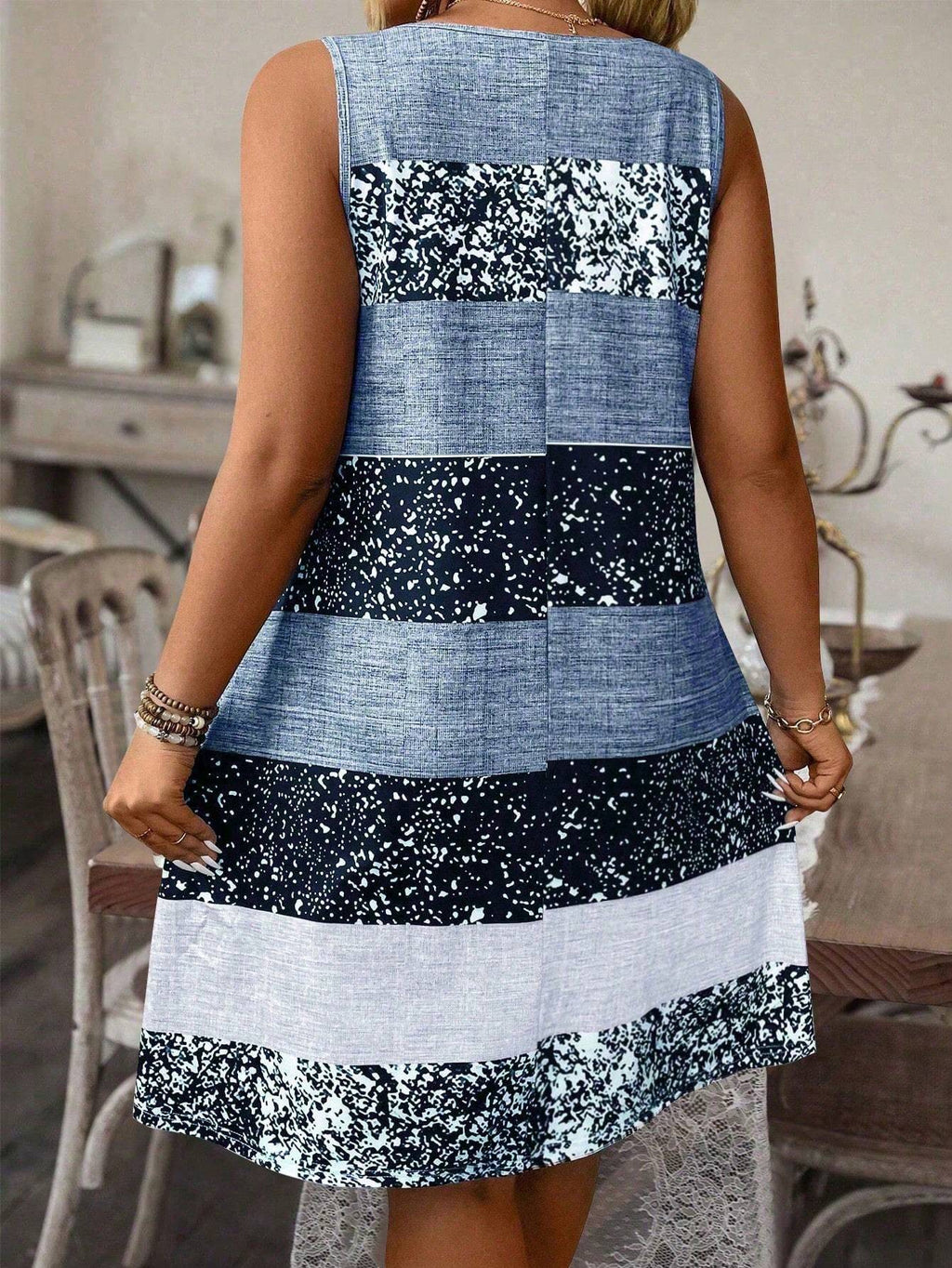 Plus size striped tank top and skirt set by FitiqueFit, casualwear featuring a sleeveless top and matching skirt in vibrant stripes.