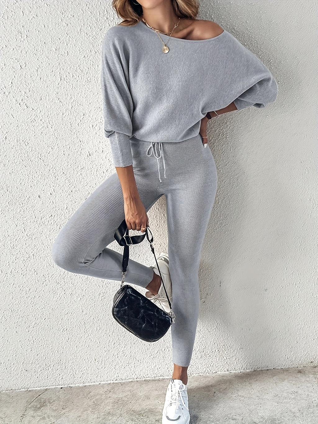 FitiqueFit long-sleeve pullover and high-waist drawstring pants two-piece set, stylish and comfortable activewear ensemble.