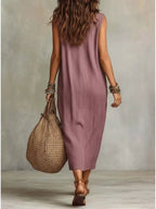 Plus size full-length midi dress with a cowl neck and sleeveless design from Trendsi, shown in a stylish, flowing silhouette.