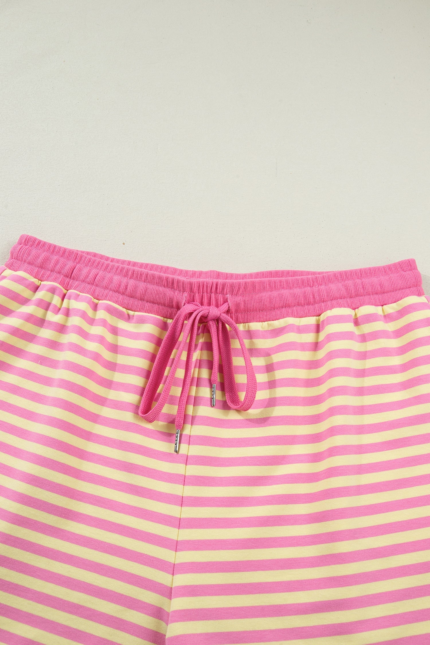 Plus size Lilliana Stripe Boxy loungewear set by Threaded Pear, featuring a striped top and matching bottoms for comfortable style.