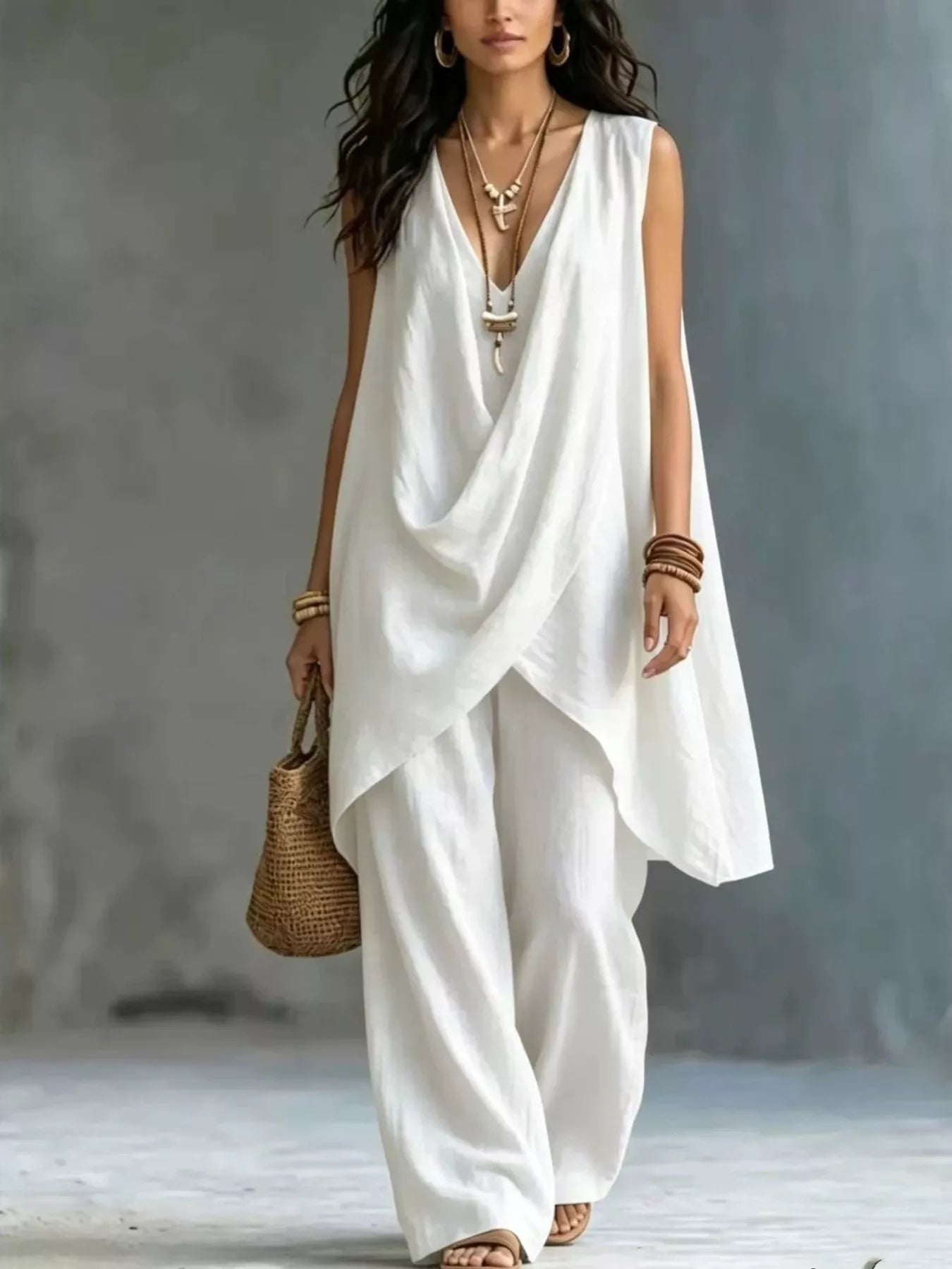 Plush Fashion Hub sleeveless asymmetrical top and wide-leg pants set, featuring a stylish and modern fashion ensemble.