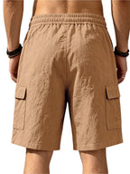 Men's plus size casual cargo shorts with drawstring waist from Trendsi, featuring multiple pockets and relaxed fit.
