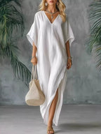 Shopimist full size V-neck maxi dress with side slits, plus size, flowing fabric, elegant design, suitable for casual or formal occasions.