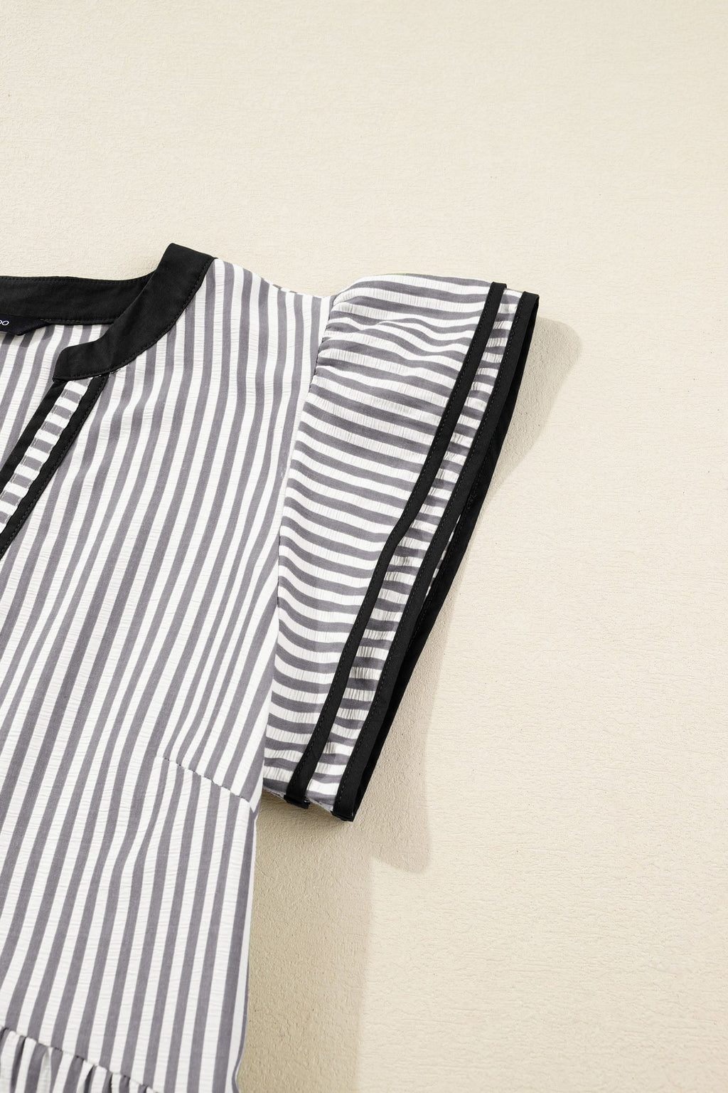 Threaded Pear Charley Sleeve Casual Long Midi Dress with relaxed fit and stylish long sleeves, displayed on a hanger.