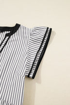 Threaded Pear Charley Sleeve Casual Long Midi Dress with relaxed fit and stylish long sleeves, displayed on a hanger.