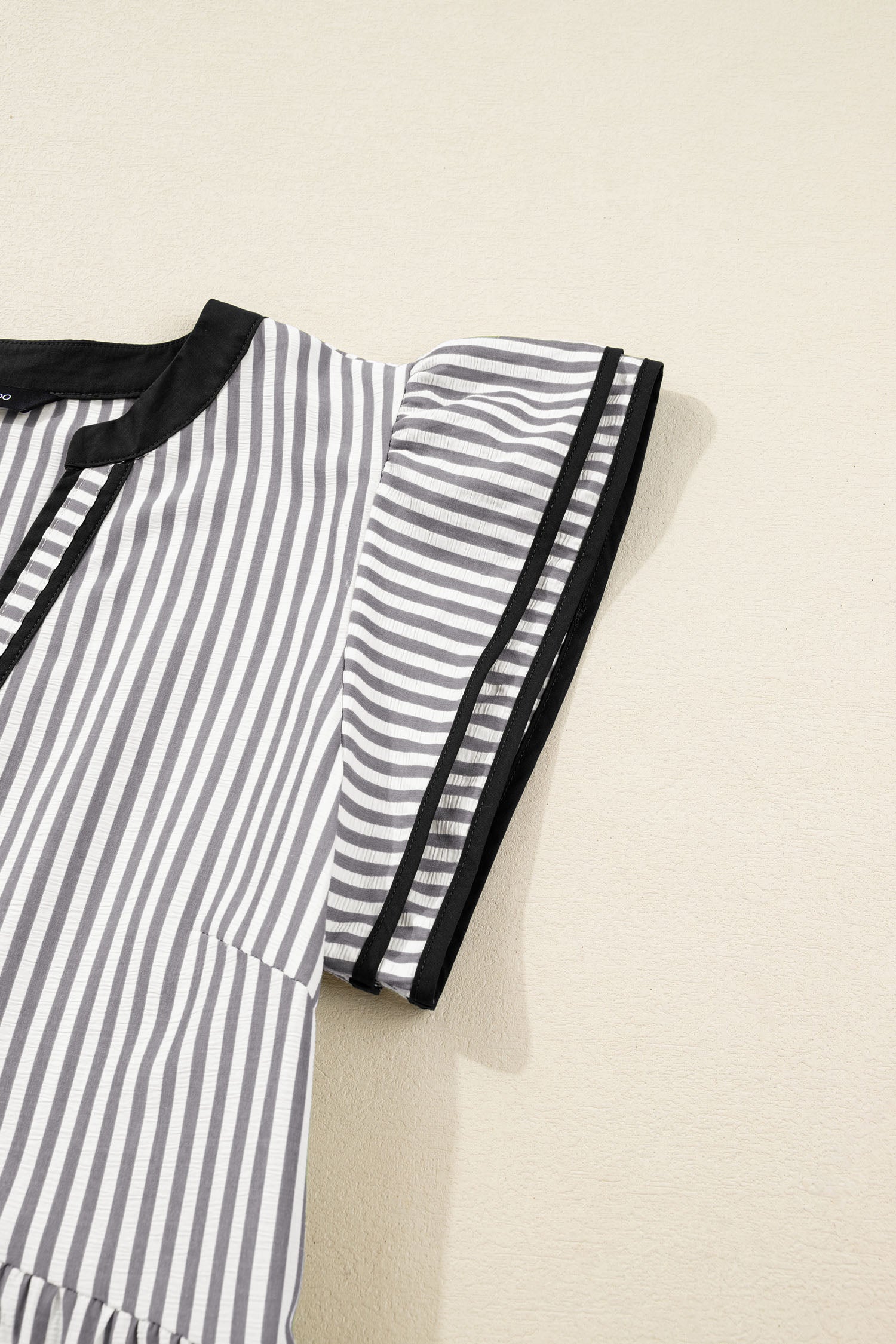 Threaded Pear Charley Sleeve Casual Long Midi Dress with relaxed fit and stylish long sleeves, displayed on a hanger.
