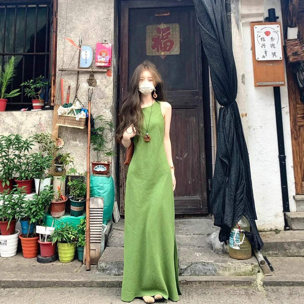 LadyShow.Store French green sleeveless vest dress displayed on a hanger, featuring a stylish and lightweight design.