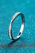 Rhodium-plated Moissanite ring with sparkling gemstone setting, elegant jewelry piece from Shopimist.