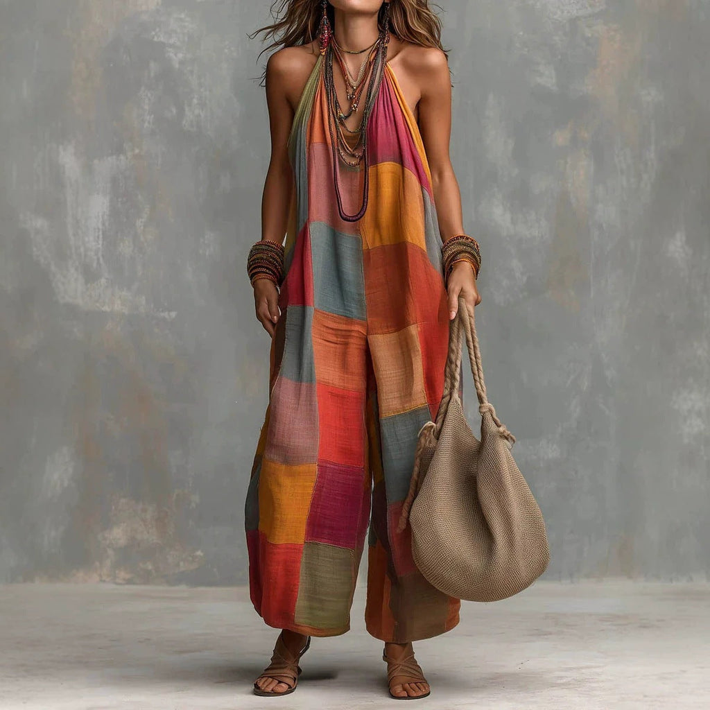 Women's plaid print jumpsuit by Plush Fashion Hub featuring sleeveless, wide-leg design with suspender-style straps.