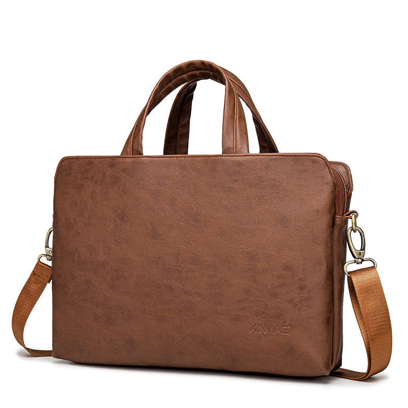 Handheld plush leather briefcase with one shoulder strap, designed for business use, from Plush Fashion Hub.