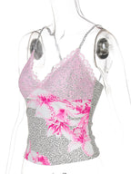 Women's leopard print cami top with delicate lace trim, stylish animal print top from Trendsi, showcasing the fabric and lace details.