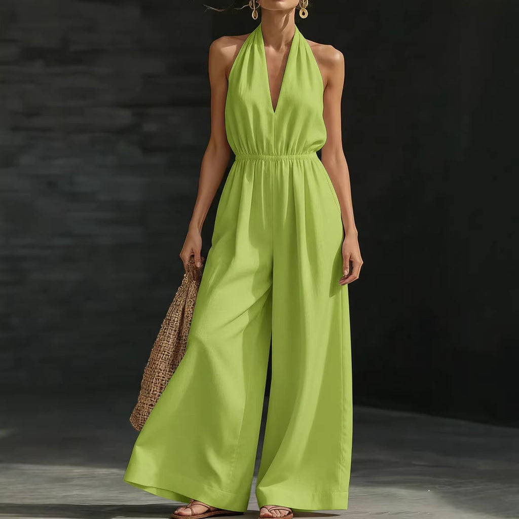 V-neck halter neck jumpsuit for women with sleeveless design, fitted waist, and wide-leg pants, in a stylish and comfortable cut.
