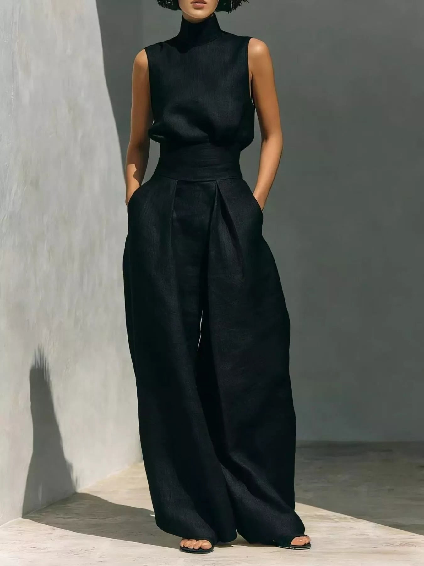 Trendsi sleeveless turtleneck top and wide-leg pants set, stylish and comfortable fashion ensemble, shown on a model.