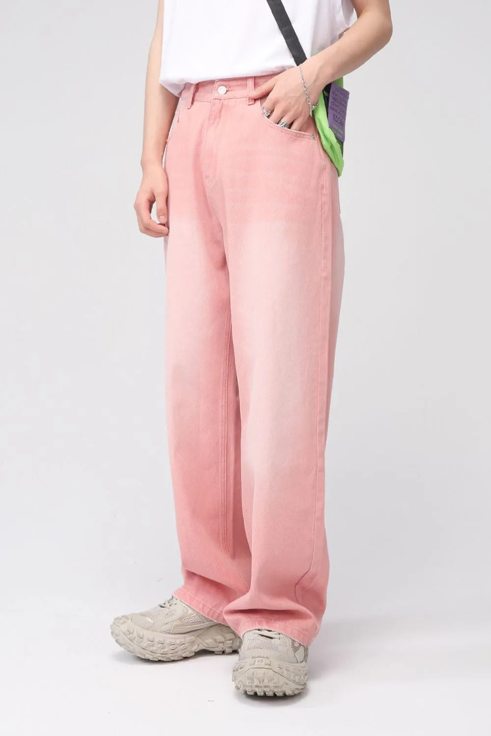 Light blue Plush Fashion Shop pocketed baggy denim jeans with relaxed fit, featuring multiple front and back pockets.