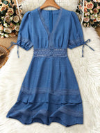 Lace detail v-neck mini dress by Shopimist featuring a fitted silhouette and delicate lace accents on the neckline.