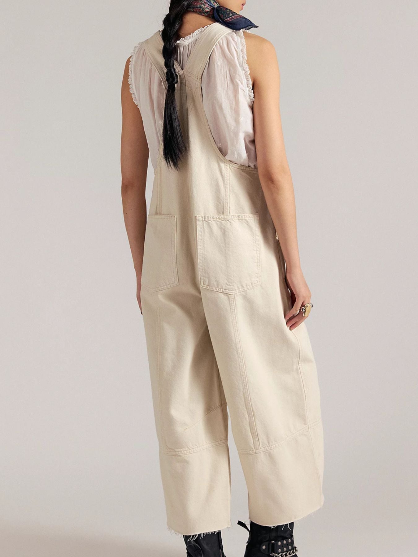 Lightweight raw hem wide-leg denim jumpsuit from Trendsi featuring casual chic dungarees with a relaxed fit and casual style.