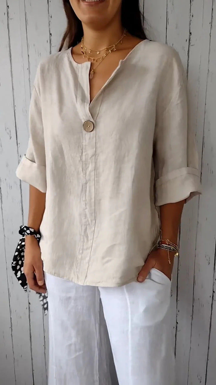 Women’s loose fit V-neck long-sleeve button top by FitiqueFit, casual blouse with relaxed fit and stylish V-neck design.