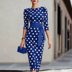 Women's retro polka-dot bodycon midi dress by FitiqueFit featuring a belted cross-tie waist and casualwear style.
