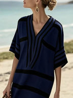 Plus size women's striped half-sleeve midi dress by Plush Fashion Hub, casual chic, stylish everyday wear with a comfortable fit.