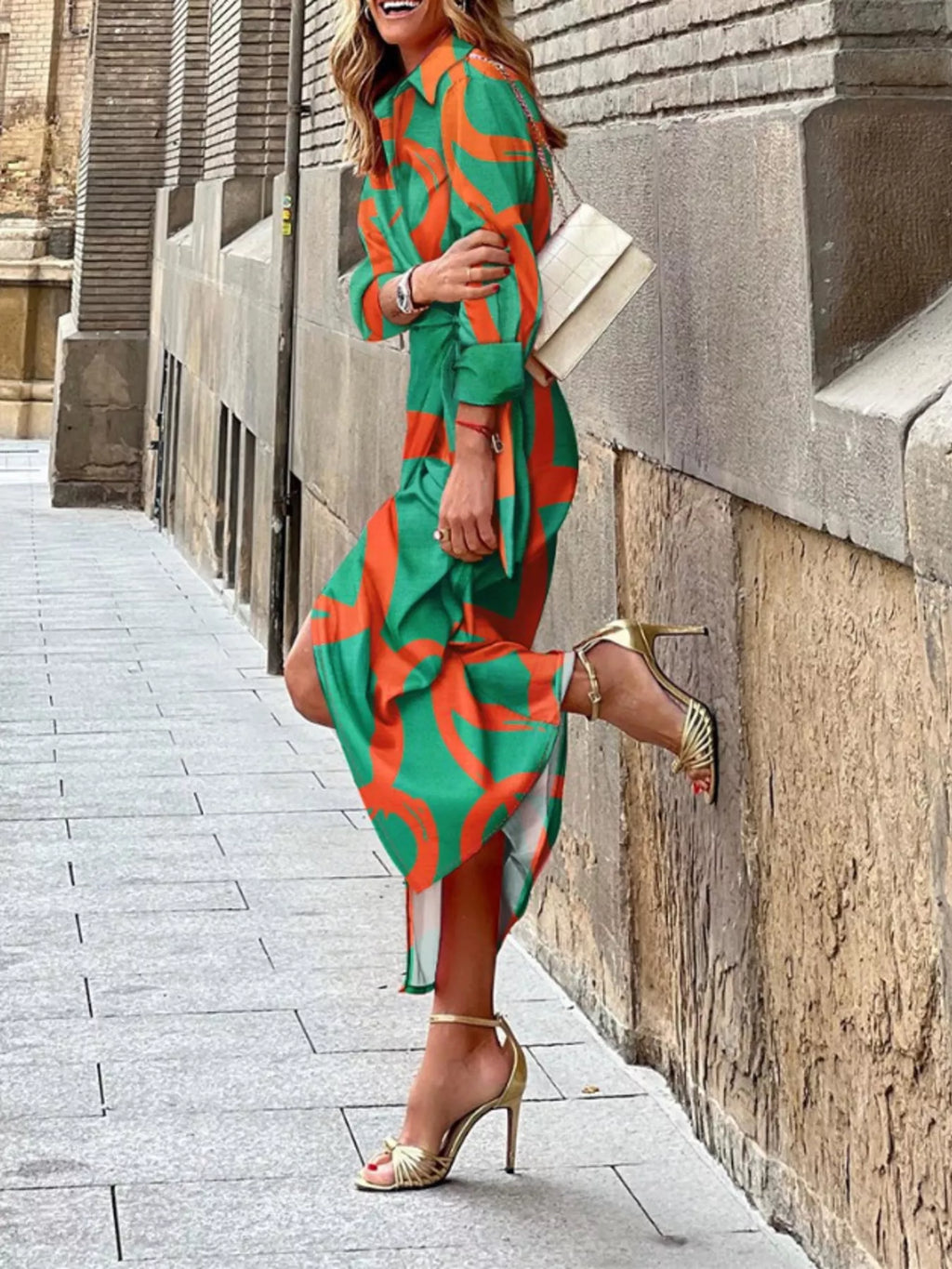 Printed collared neck shirt dress by Plush Fashion Hub, featuring a stylish design and button-front closure in the image.