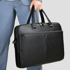 Large capacity men's horizontal briefcase by Plush Fashion Hub, made of cowhide, holds a 17-inch computer and essentials.