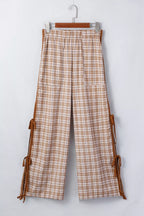 Plaid print casual pants with tie detail from Plush Fashion Hub, featuring a relaxed fit and stylish plaid pattern.