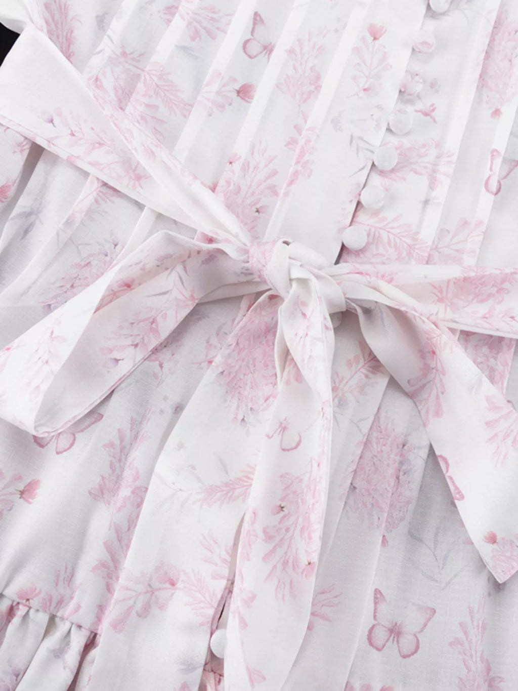 Floral print layered ruffle dress by Shopimist with flowing fabric and feminine design, perfect for spring or summer occasions.