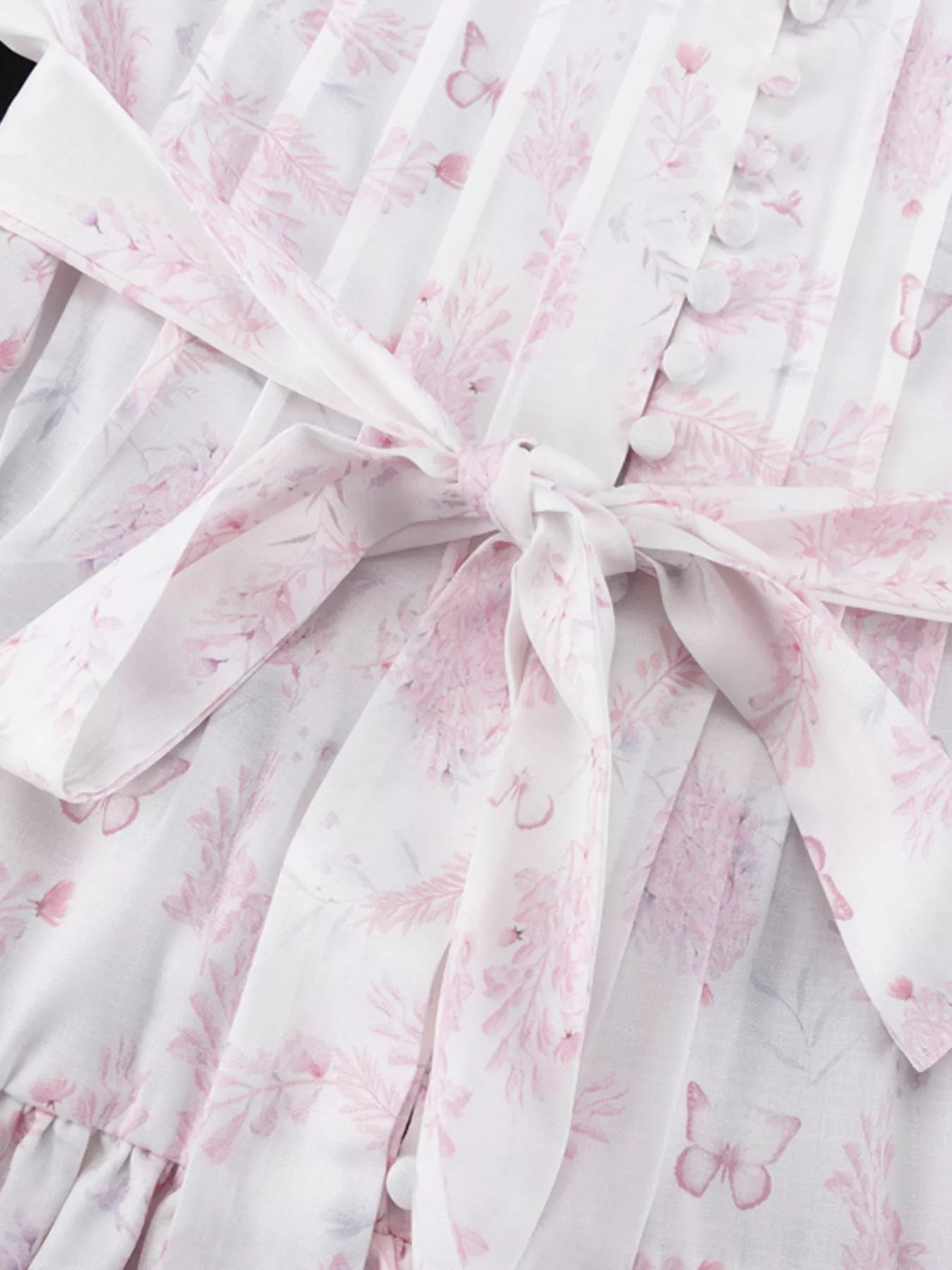 Floral print layered ruffle dress by Shopimist with flowing fabric and feminine design, perfect for spring or summer occasions.