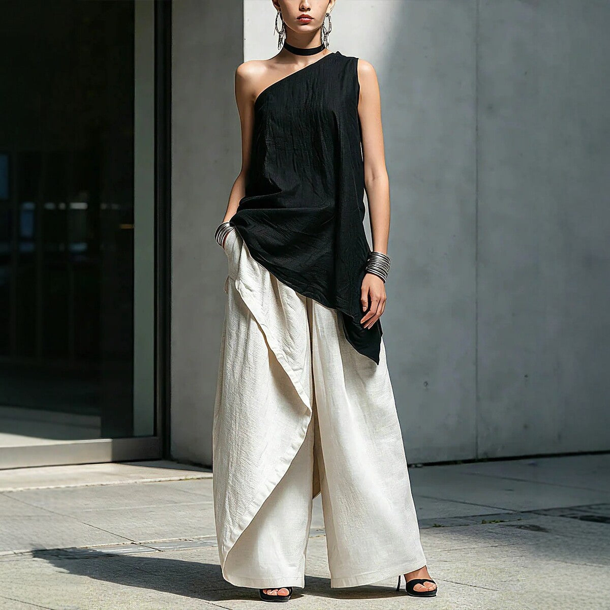 Women's one-shoulder asymmetric sleeveless top from Plush Fashion Hub, showcasing stylish design and modern fashion details.