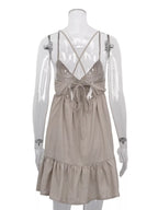 Backless spaghetti strap mini dress by Shopimist, showing a stylish, fitted dress with thin straps and a backless design.